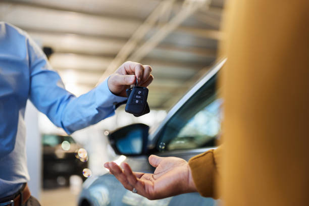 Receiving car rental keys at Zanzibar airport